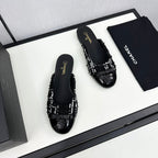 CHANEL BOW MULE IN BLACK MIX WHITE FUR AND CALFSKIN