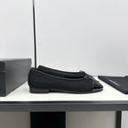 CHANEL BALLET FLATS IN BLACK TWEED AND CALFSKIN