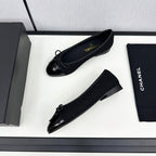 CHANEL BALLET FLATS IN BLACK TWEED AND CALFSKIN