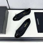 CHANEL BALLET FLATS IN BLACK TWEED AND CALFSKIN