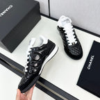 CHANEL SPORTS SHOES IN GLOSSY BLACK CALFSKIN