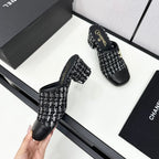 CHANEL HIGH MULE IN BLACK MIX WHITE WOOL TWEED AND CALFSKIN