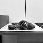 CHANEL FLAT MULE IN BLACK WOOL TWEED AND CALFSKIN GOLD HARDWARE