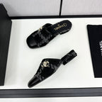 CHANEL FLAT MULE IN BLACK WOOL TWEED AND CALFSKIN GOLD HARDWARE