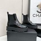 CHANEL 25S SHORT BOOTS IN BLACK CALFSKIN AND CANVAS