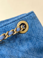 CHANEL DRAWSTRING BUCKET BACKPACK 24 IN MALIBU BLUE DENIM GOLD HARDWARE