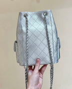 CHANEL DRAWSTRING BUCKET BACKPACK 24 IN SILVER-TONE LAMBSKIN SILVER HARDWARE