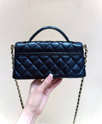 CHANEL QUILTED FLAP BAG WITH HANDLE 20 IN BLACK LAMBSKIN GOLD PLATED METAL