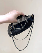 CHANEL MESH POUCH 20 IN BLACK EFFECT LAMBSKIN WITH GOLD HARDWARE