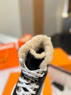 HERMES CHEALSEA BOOTS IN BLACK LAMBSKIN AND FLEECE LINING