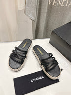 CHANEL SLIPPERS CROSS STRAPS IN BLACK LAMBSKIN
