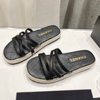 CHANEL SLIPPERS CROSS STRAPS IN BLACK LAMBSKIN
