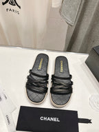 CHANEL SLIPPERS CROSS STRAPS IN BLACK LAMBSKIN