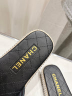 CHANEL SLIPPERS CROSS STRAPS IN BLACK LAMBSKIN
