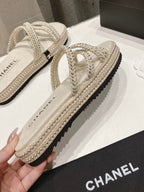 CHANEL WOVEN STRAP SLIPPERS IN WHITE LAMBSKIN